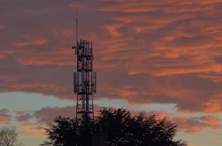 Telecommunications mast against an evening sky